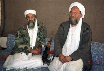 Osama bin Laden (L) sits with his adviser and purported successor Ayman al-Zawahiri, an Egyptian linked to the al Qaeda network