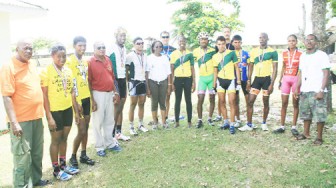 Some of the cyclists along with officials after yesterday’s event. (Orlando Charles photo)  