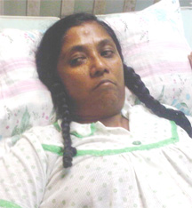 Nirmala Sugrim from her hospital bed yesterday.