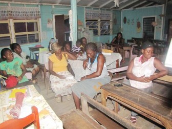 Buxton residents meeting with Minister of Home Affairs Clement Rohee. (GINA photo)