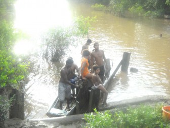 The search team returning in Mahadeo’s boat without success