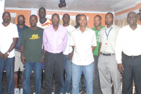  Executive members of the GABF pose with some of the players at the Waterchris Hotel yesterday.  