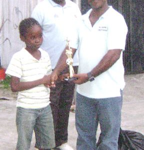 A participant of the programme, who aspires to be the next president of Guyana, as he collected his MVP trophy for football. 