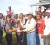 C Ramnauth presents the Balram Shane trophy in the three-year-old event to Cynthia Jagdeo for the victory won by Better than Gold. 