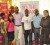 Third from right, Delroy Sookram, Gregory Dean and Coline Roberts pose for a photo opportunity during the honorary event. 