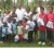 Health Minister Dr Leslie Ramsammy with children who received hampers (GINA photo)