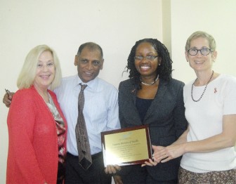 (From left to right) USAID Mission Director Carol Horning, Minster of Health Dr Leslie Ramsammy, FXB Country Director Nicole Jordan-Martin and FXB Principal Investigator Virginia Allred during the presentation of a plaque to the Ministry of Health. 