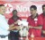 Manager of the Texaco Bel Air Service Station Kumar Persaud, right,  hands over the sponsorship cheque to president of the Guyana Chess Federation Shiv Nandalall.