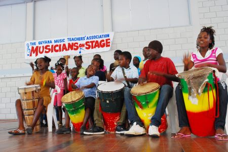 Buxton Fusion students and Annai residents during a performance