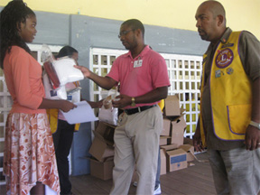 Lions Club members during the distribution. 