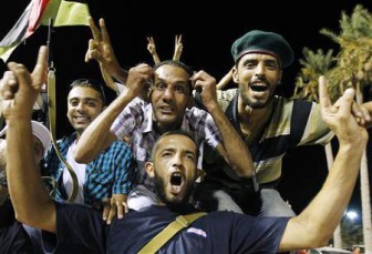 Rebels celebrate (Reuters photo)