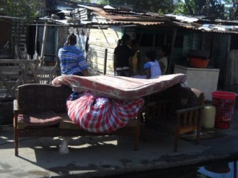 Some of the displaced from the fire and the belongings they managed to save