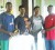 Universal Sports Club Chief Executive Officer, Andrew Budhan, (right) poses with Under-19 players Ronsford Beaton, Amir Khan and Chanderpaul Hemraj (left to right).