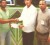 Gizmos & Gadgets Marketing  Manager Mr. Trevor Rose hands over the cheque to RHTYSC cricketer Rajiv Ivan.