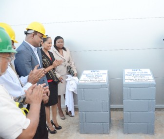  President Bharat Jagdeo and others moments after unveiling the plaque to commemorate the commissioning of the new GPL’s new 15.6 MW Kingston Power Plant yesterday.  (Anjuli Persaud photo)