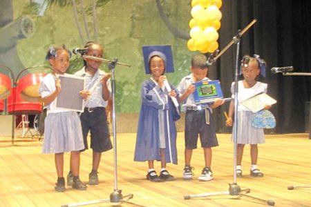 Pupils of the East Street Nursery reciting a poem at the Ministry of Education’s Schools Welfare Services attendance rally.