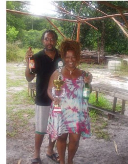 Warren and Tracy Douglas displaying their product and their GuyExpo trophy