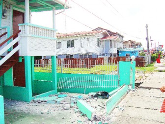 Less than two months after a car ploughed into the upper story of the house owned by the Razack family of Bagotstown, East Bank Demerara, another vehicle smashed into the fence of the property yesterday. (See story on centre pages) 