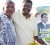 AFC presidential candidate Khemraj Ramjattan (right) and a supporter. (AFC photo)