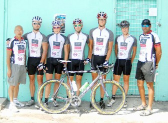  The California-based team and their coaches posing for a photo before the start of stage two at Rosignol. From right are Roger Farrell, overall five- stage winner Michael Larsen, second place finisher Jonathan Teeter, Adam Carr, Nicholas Sorrensen and Henner Rodel and Peter Sue. (Orlando  Charles photo)