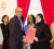 President Bharrat Jagdeo hands over the signed Declaration on Birth Registration to Aleema Nasir, chairperson of the Rights of the Child Commission (ROC).