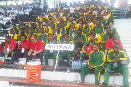 Guyana’s IGG contingent at the opening ceremony yesterday in Suriname at Andre Kamperveen Stadium. (Treiston Joseph photo)  