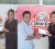 In the composite picture above, Secretary of the Kashif and Shanghai Organisation, Sonia Stanislaus, receives the donations from Senobia Butcher of Café Paradise and at right from Leonard Butcher of the Canadian Fast Food Franchise, Dixie Lee.   