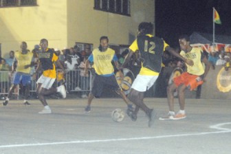 Action during the final night of Group Stage matches on Saturday at the East Ruimveldt Community Center Groud.