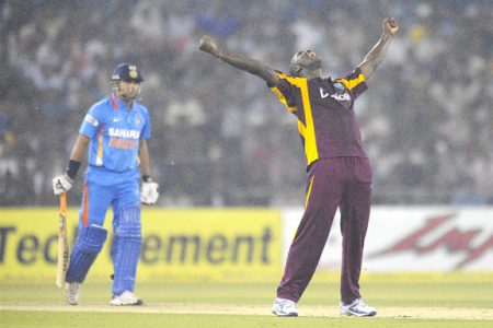 Andre Russell is pumped up after getting the key wicket of Suresh Raina. (WindiesCricket.com)
