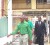 APNU presidential candidate David Granger [left] along with Joseph Harmon and attorney-at-law Basil Williams [centre and right respectively] as they left the Brickdam Police Station compound yesterday. 