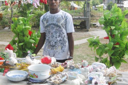 Eieon Sampson with the ornaments his mother had washed and put out to dry