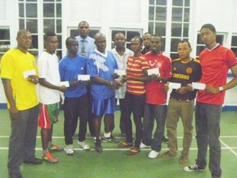 Representatives of teams that did not make the final four of the GFA/Banks Beer Knockout tourney display their cheques. 