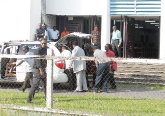  Phillip `One Foot’ George’s Casket leaving the church after the funeral service at the Our lady of Fatima Cathedral on North Road yesterday. (Orlando Charles photo)