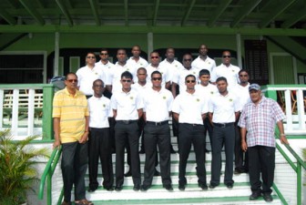 FINALLY OFF! Members of the Amazon Conquerors along with president Ramsay Ali and vice-president Faizul Bacchus just before the team departed the Georgetown Cricket Club ground for the Cheddi Jagan International Airport yesterday morning.