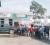 Several customers lined up at the Adventure office of the Guyana Oil Company on the Essequibo Coast yesterday morning to receive payments for damage to their vehicles after they used tainted fuel sold by the company. 