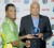 Leon Johnson gets the Star of the Match award from John Maginley, Antigua’s Minister of Tourism