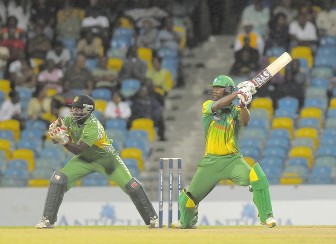 Johnson Charles cuts Veerasammy Permaul during his match winning innings that sent Guyana out of this year’s CT20 competition in Barbados earlier this morning.