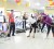 Yesterday, Courts Guyana Inc launched a “Get Fit for Mash” Promotion and invited customers to take part in an in-store exhibition. In the photo are Soca songstress “Vanilla” and two staff members of Courts during an aerobic workout display. (Photo by Anjuli Persaud)