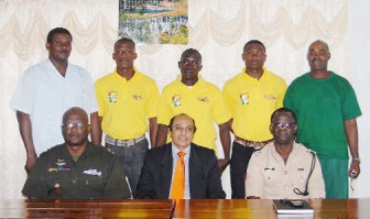 From left standing Lyndon Wilson, Rupert Perry, Winston George, Quinse Clarke and Robert Chisholm pose with Lieutenant Colonel Lawrence Fraser (extreme left sitting), KA Juman Yassin (middle sitting) and Colin Boyce (extreme right sitting) at the press conference yesterday. (Orlando Charles photo)     
