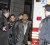 Ray Lazier Lengend, 40, (centre) being led out of the 103 rd Precinct stationhouse and into an ambulance Tuesday night. (New York Daily News photo)