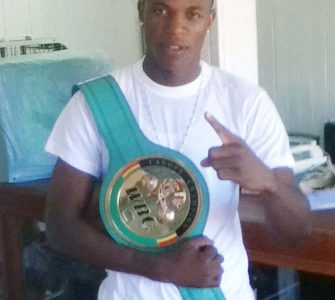 Simeon ‘Candy Man’ Hardy proudly poses with his WBC CABOFE welterweight title belt.