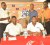 President and vice-president of the Guyana Amateur Basketball Association (GABA) Kester Gomes and David Carto seated at left and right, pose for a photo opportunity with the representatives of   the top three teams of the Banks DIH Limited 2011 Basketball tournament at the launching of the 2012 Basketball League yesterday at Thirst Park Sports Club. (Aubrey Crawford photo)