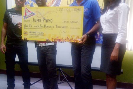 From left to right: Adrian Dutchin, Jumo Primo, Nigel Worrel  and Darshanie Yussuf moments after the winning cheque was presented. 