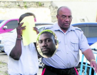 Charwin Jermaine Estwick (inset) was remanded after appearng in court charged with stealing more than $164 000 from two clients. (Barbados Nation photo)
