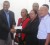 Minister of Natural Resources, Robert Persaud (left) hands over the cheque to Minister of Amer-indian Affairs, Pauline Sukhai. (GINA photo)