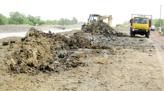  A truck waiting to transport the dirt that was being removed