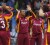 West Indies players celebrate the fall of another Australia wicket. (Brooks LaTouche Photography/www.digicelcricket.com)