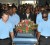 Members of the Queen's Park Cricket Club carrying the casket into the church. (Trinidad Express)