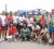 Winners and runners up pose with their Powerade energy drinks and their respective trophies and prizes at the end of the Banks DIH sponsored 50-mile road race yesterday. (Orlando Charles photo)