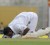 ARISE, GALLANT SHIV! Guyana’s Shivnarine Chanderpaul continues his tradition of kissing the pitch at Kensington Oval yesterday where he not only scored his 25th test ton but where he also surpassed Brian Lara as the West Indian batsman with the most runs at the venue. (DigicelCricket.com/Brooks La Touche.